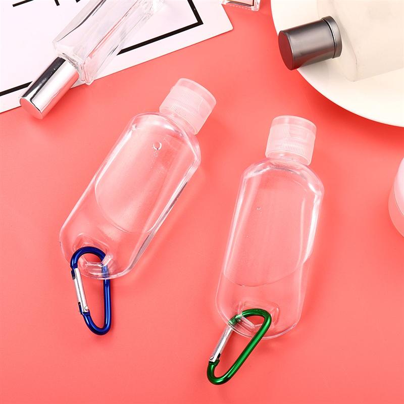Botellas de Gel desinfectante de manos, Mini botellas recargables de viaje, contenedor de Alcohol con gancho aleatorio, 50ml, 10 Uds.