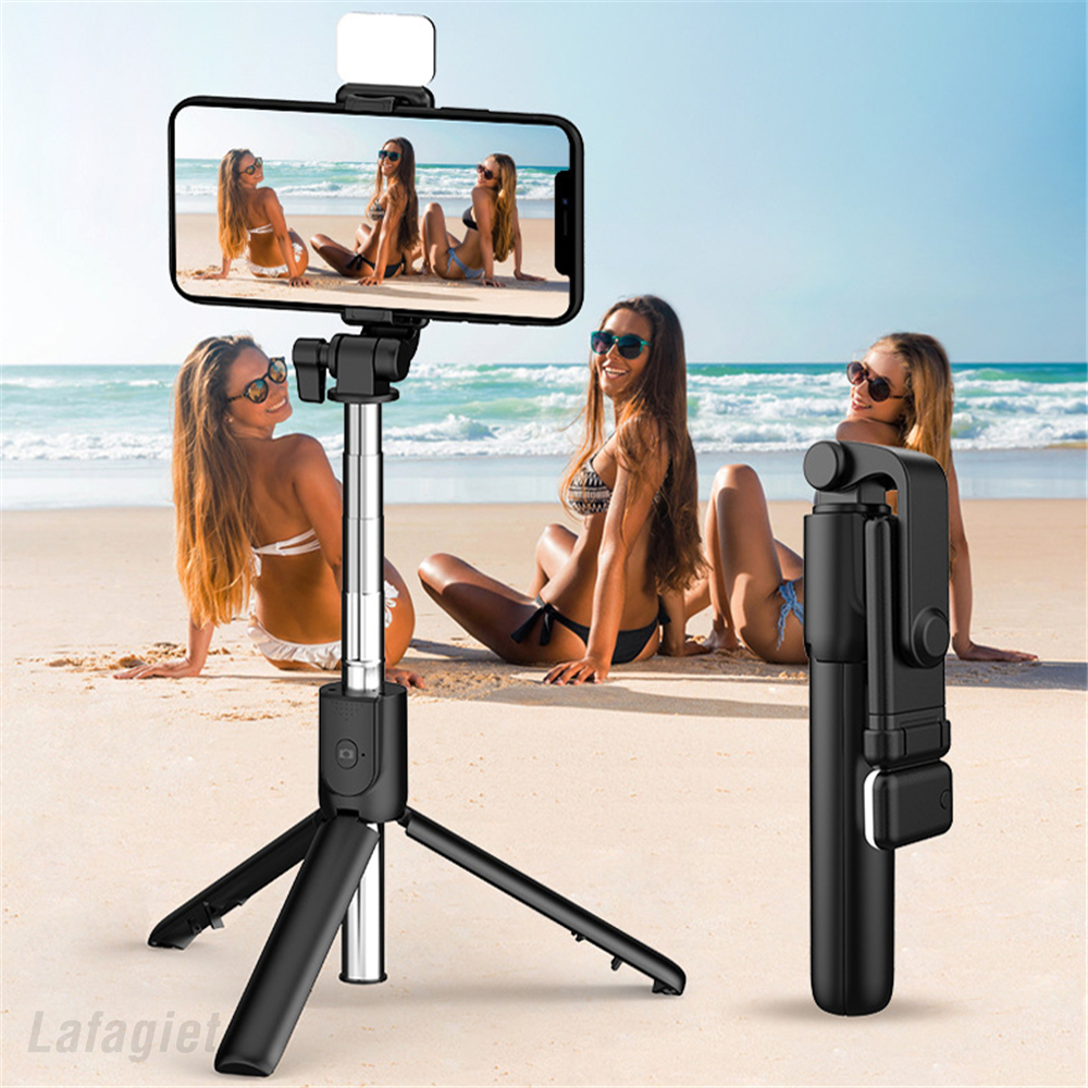 Tragbarer, kabelloser bluetooth-selfie-stick mit ausziehbarem und faltbarem stativ für ios, android und iphone.
