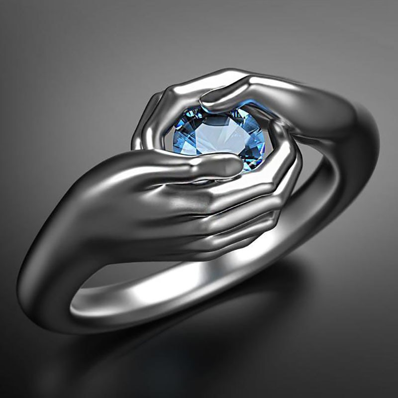 Anello di zircone di cristallo blu tenuto in mano di Design unico per le donne regalo di san valentino classico coppia abbraccio anello di fidanzamento di nozze gioielli