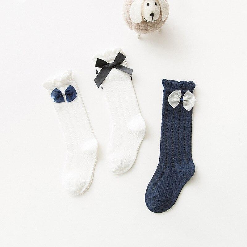 Calzini per bambini a tubo lungo per bambini calzini alti in cotone per bambini calzini caldi per bambini in cotone bianco con fiocco principessa adorabile