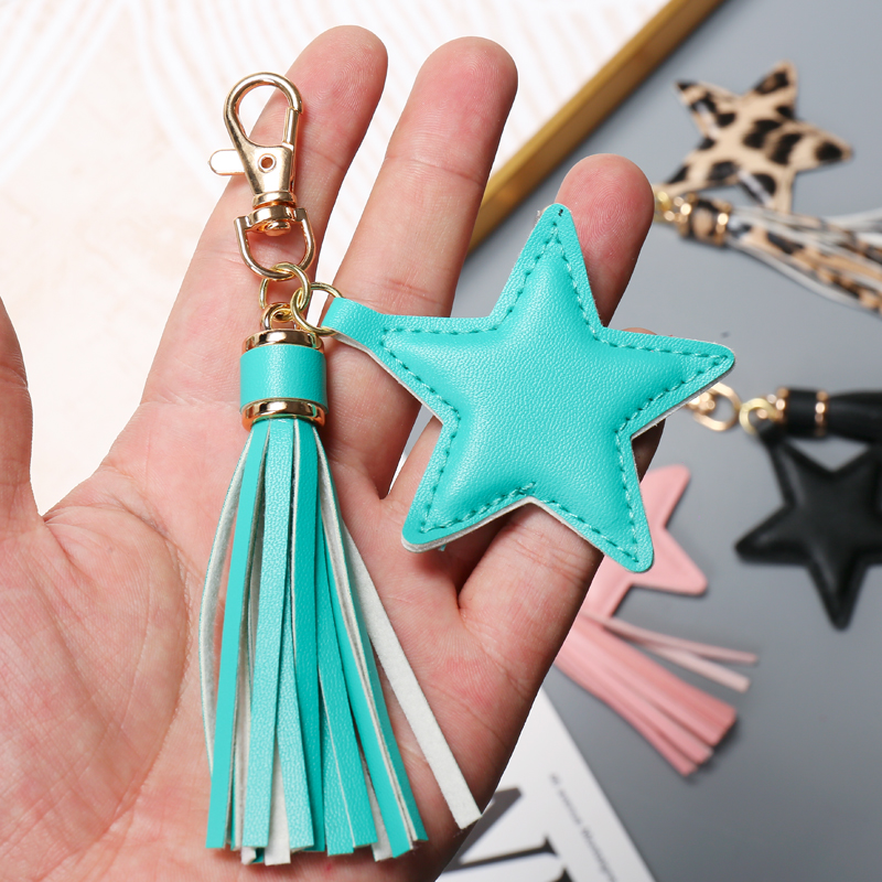 LLavero de borla de cuero PU a la para mujer y niña, colgante de estrella, llaveros con cierre de langosta, accesorios para bolso