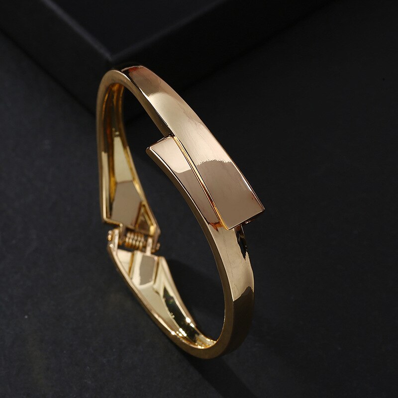 Pulsera de aleación con línea cruzada para mujer, brazalete sencillo de oro, a la , con personalidad