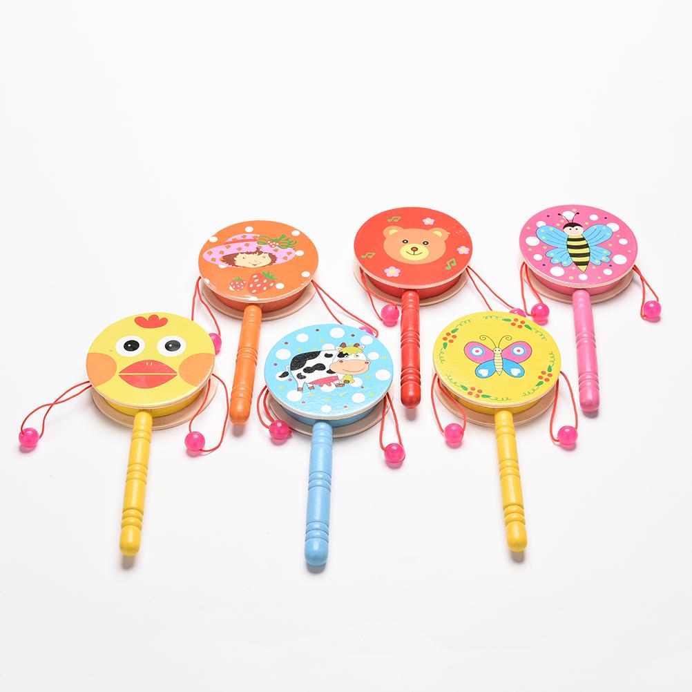 Sonajero tradicional chino para bebés y niños, juguetes giratorios de tambor, sonajero de tambores de madera, instrumento Musical, campana de mano de dibujos animados, 1 Uds.