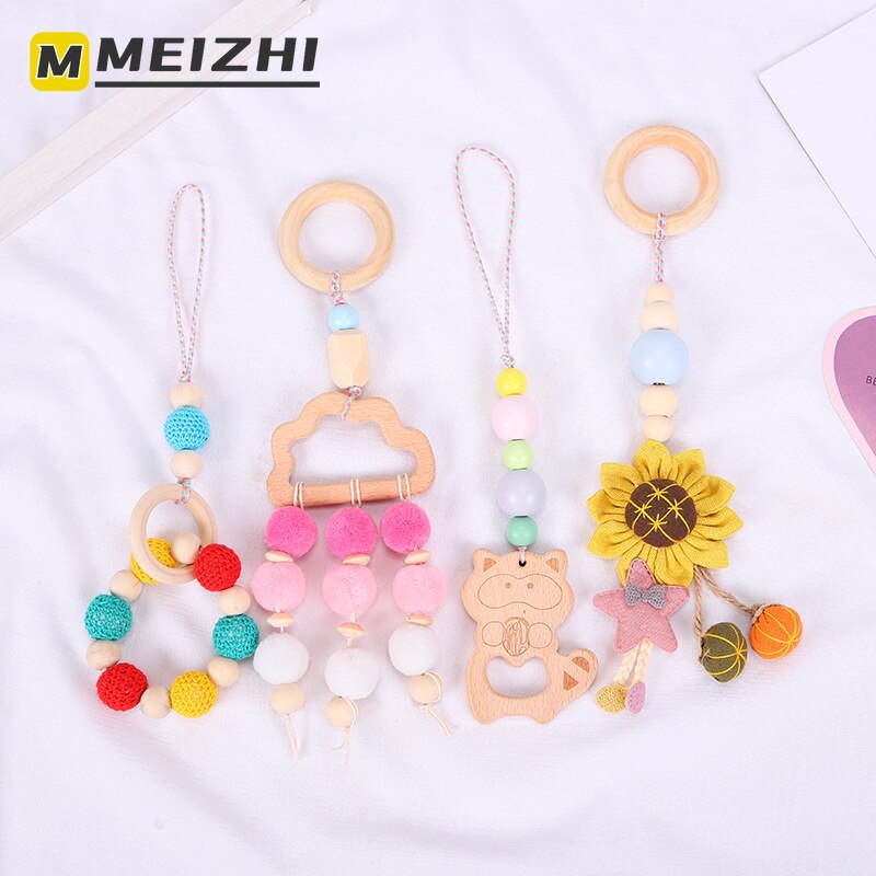Meizhi Zachte Anti-Vallen Babykamer Decoratie Hanger Gekleurde Wol Kraal Soort Houten Ring Hanger Vier Stuk Kind molaire Speelgoed