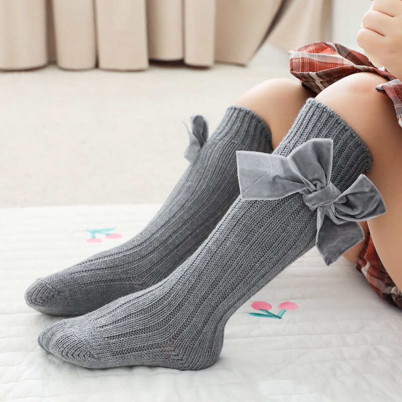 Calzini alti al ginocchio per ragazze invernali calzini per bambini grandi con fiocco scaldamuscoli solidi principessa bambini calzini morbidi a maglia lunga per 1-8 anni