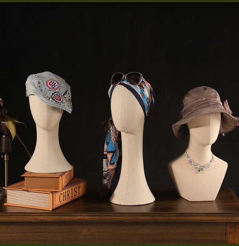 Vrouwelijk abstract mannequin hoofd display hoed pruik sjaals hoofddoeken ketting insteeknaald schuimdoek fluwelen stof witkop