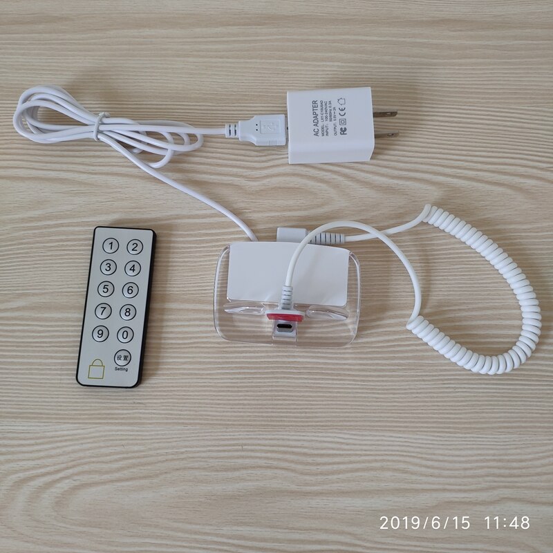 HOUZE, Mobile phone display shelf anti theft