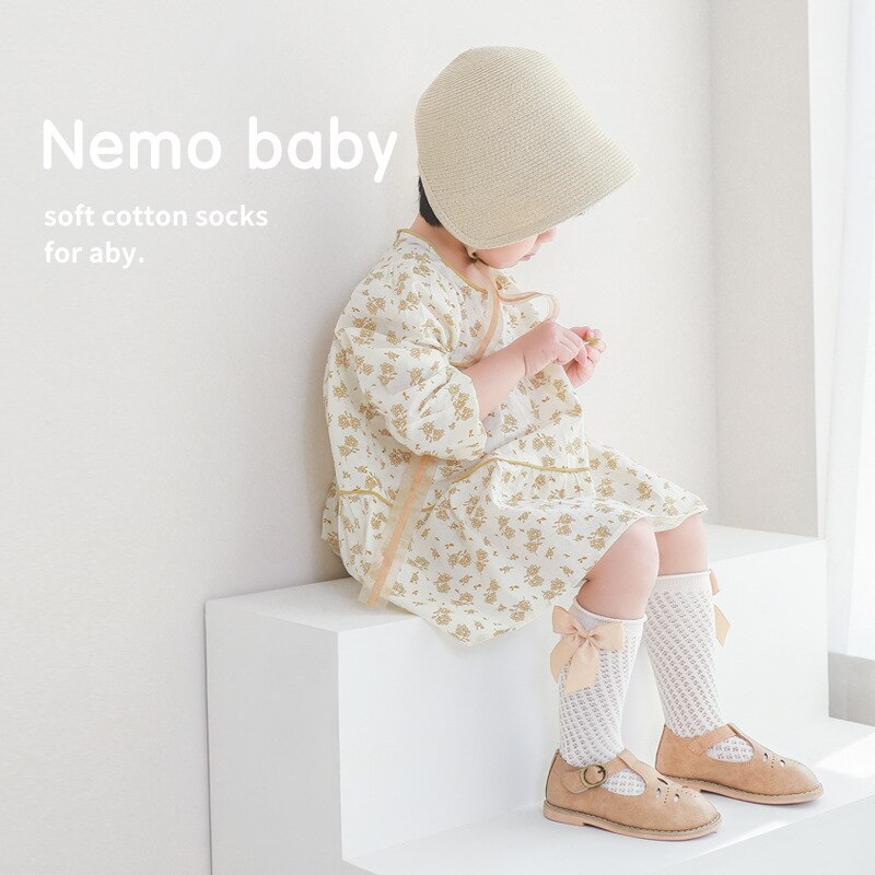 Verão crianças meias floral grande arco crianças meninas joelho alta meia longa algodão macio oco para fora meias do bebê malha menina princesa socken
