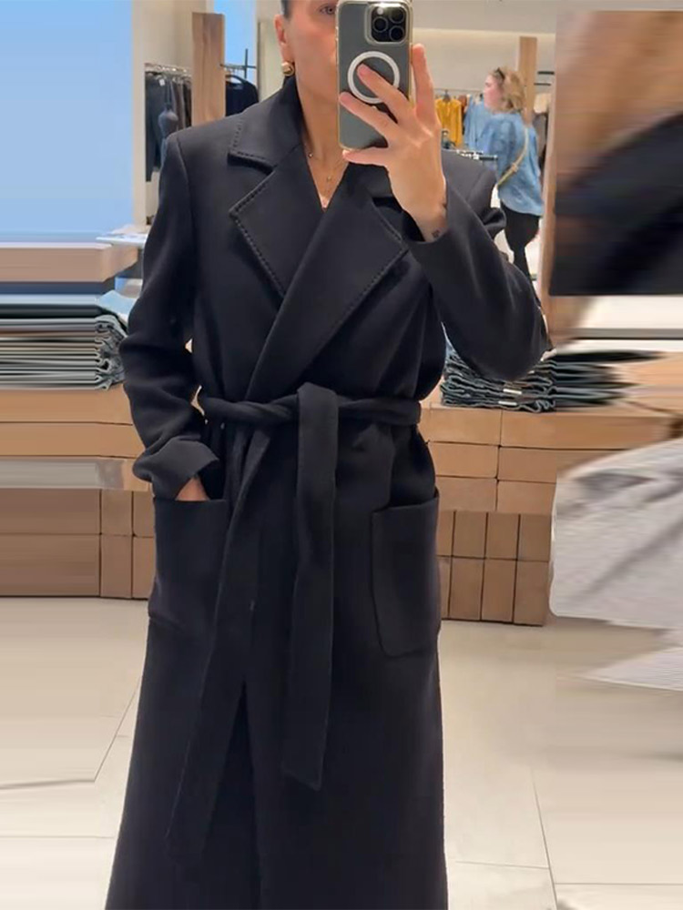 Elegante dames zwarte lange jas met riem Stijlvolle revers Veterschoenen Trenchcoat Herfst Winter Wolmix Bovenkleding Mode-outfit