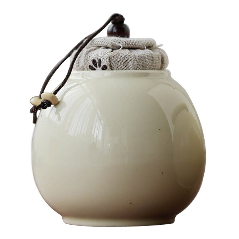 Ceramic tea cans, small sealed tea cans, tea bins, lake stone bean yellow glaze tea cans