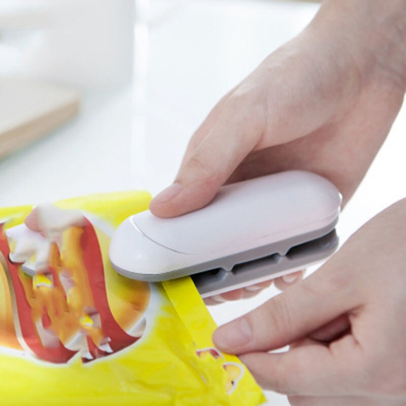 Mini-zakkensluiter, draagbare 2 in- in-1 warmtesealer en snijder, hersluiter voor verse snacks en zakjes (grijs)