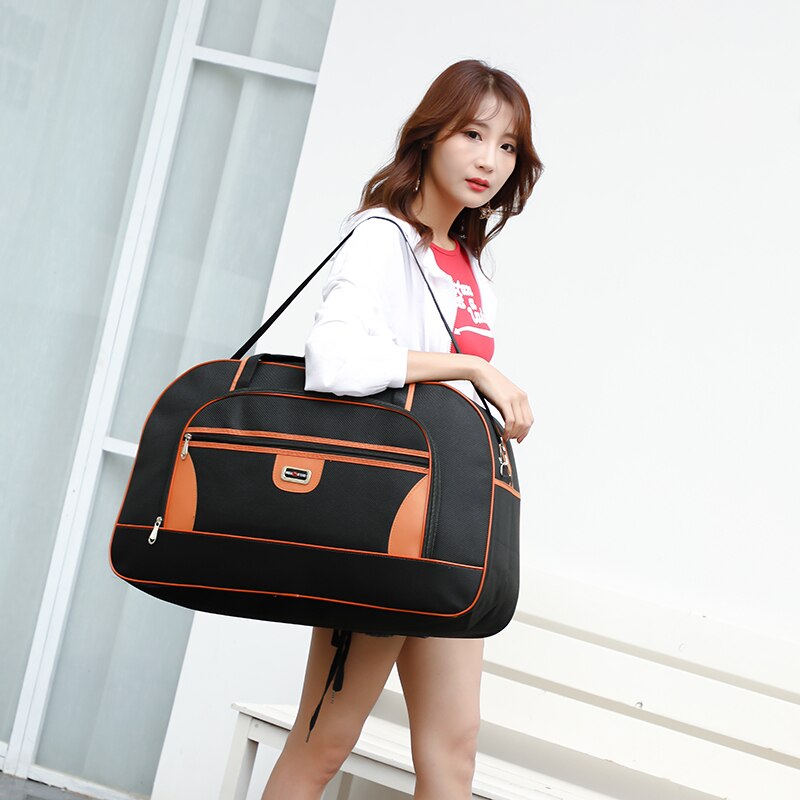 Super grande capacité sac de voyage pour femmes imperméable à l'eau hommes sacs polochon voyage Weekender nuit bagage à main grand sac à bandoulière