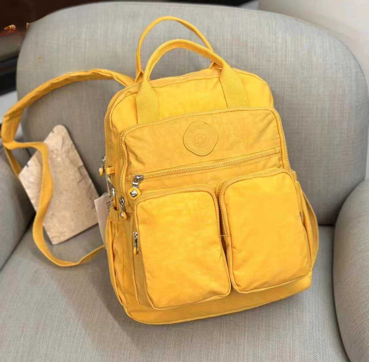 Multi-pocket Woman's Backpack Soft Handle Solid Color Nylon Travel Backpack Lightweight Casual School Backpacks: Brown