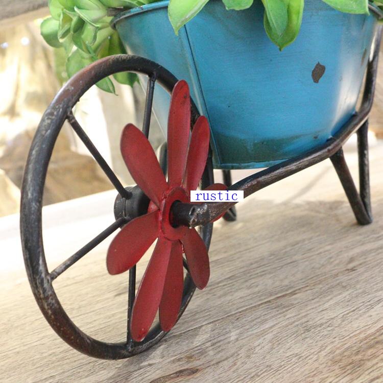 small handcrafted rustic retro metal planter cart