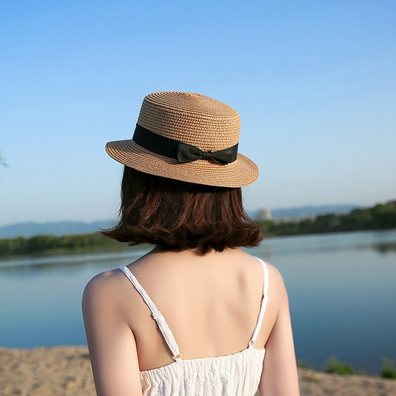 Rep platt hatt halm solskydd kvinnlig halm rosett utomhus sol strand hatt sommar hattar kvinnor keps panama kepsar