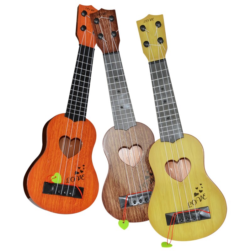 Mini ukelele instrumento Musical, guitarra infantil, juguetes creativos, juego escolar para niños, educación y aprendizaje, de Navidad