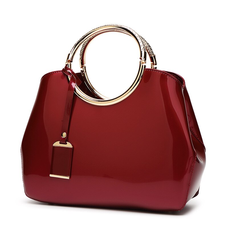 Saco de concha das mulheres 2019 nova moda europeia e americana couro patente um ombro saco do mensageiro textura rosto brilhante bolsa: Wine