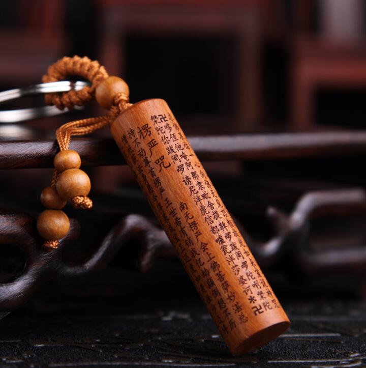 Chinese Perzik Hout Gesneden Cilinder Hanger Veilige En Goede Luck Woord Boeddhisme De Shurangama Mantra Prachtige Auto Sleutelhanger Pendan