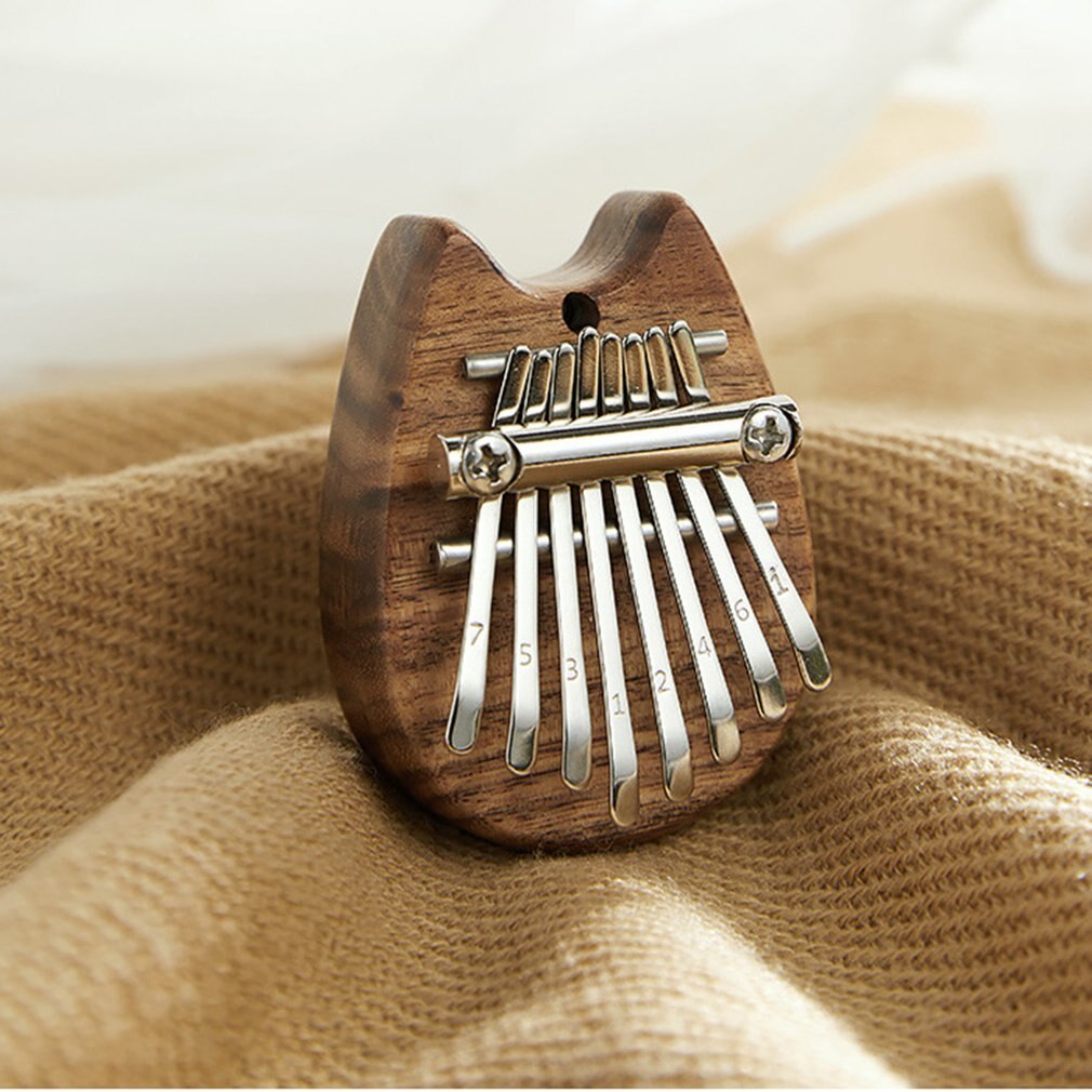 Mini Piano à pouce Kalimba 8 touches, exquis, clavier à grands sons, Instrument de musique E4W, Portable, pendentif, , nouveauté
