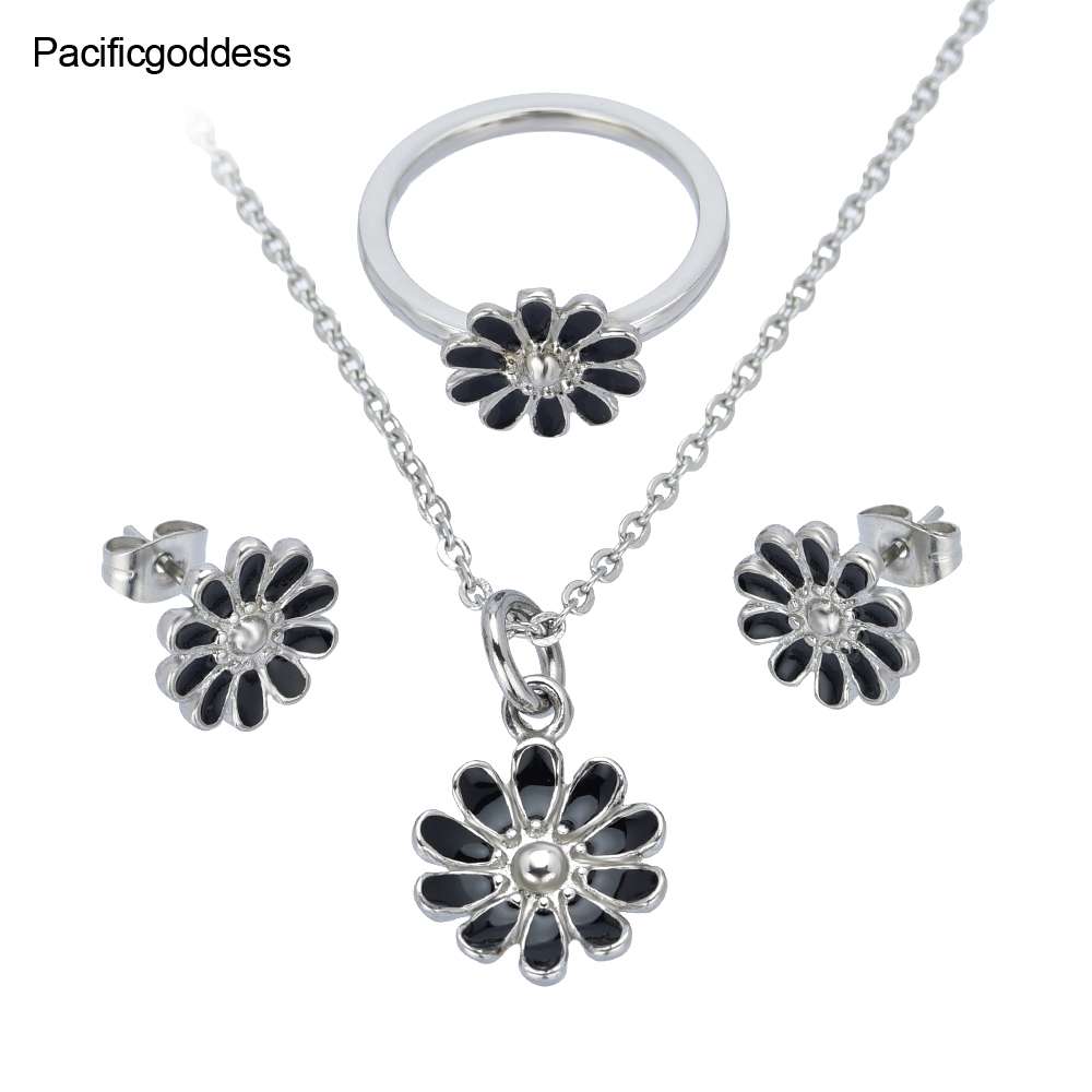 earrings necklace and rings set in stainless steel jewelry