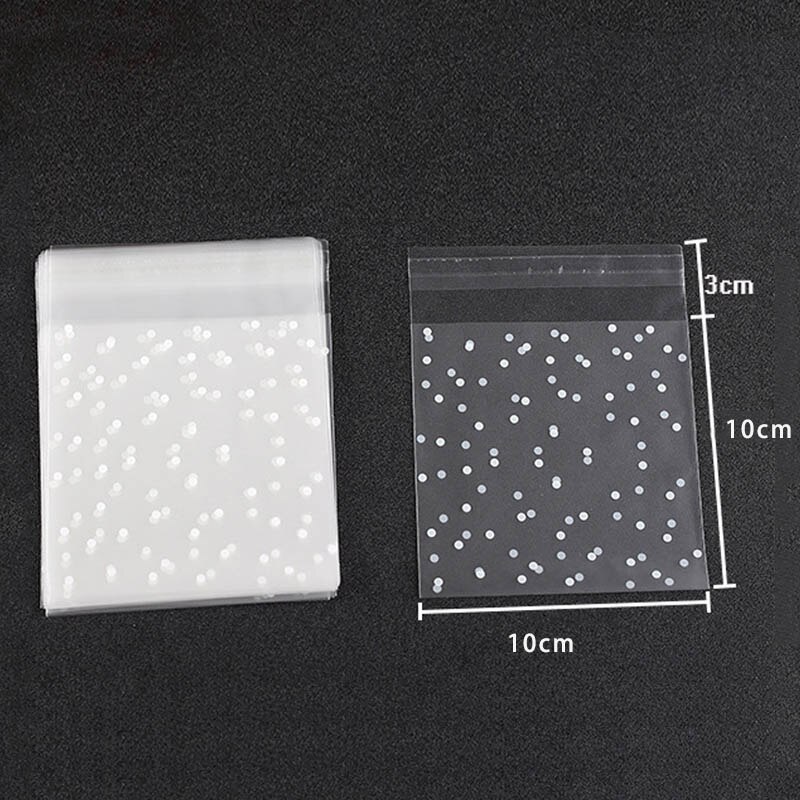 Valkoiset pisteet keksipaketti syntymäpäiväjuhlasisustus karkkipussi himmeä muovikeksipakkaus mattajuhlapakkauspussit: 10 x 10cm
