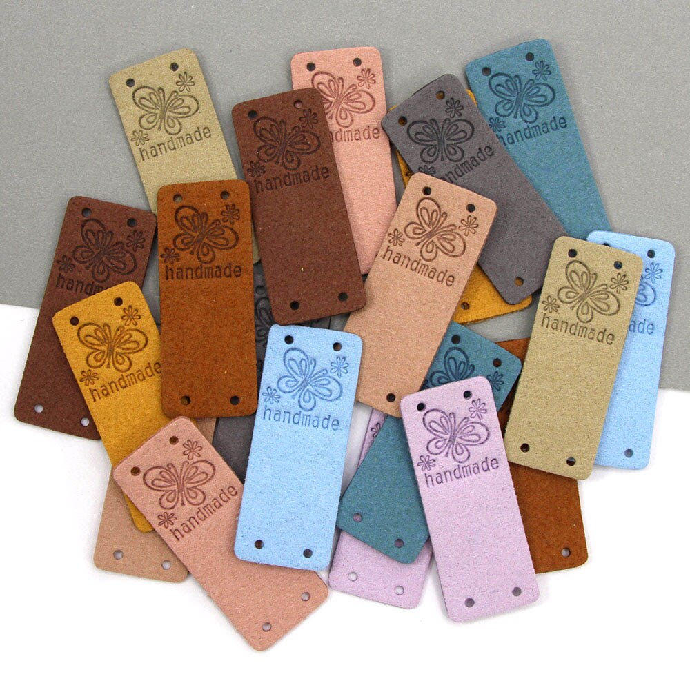 Etichetta fatta a mano farfalla 20 pezzi etichette in pelle per abbigliamento etichette fatte a mano per cucito cappello fai da te accessori per cucire 2x5CM 10 colori