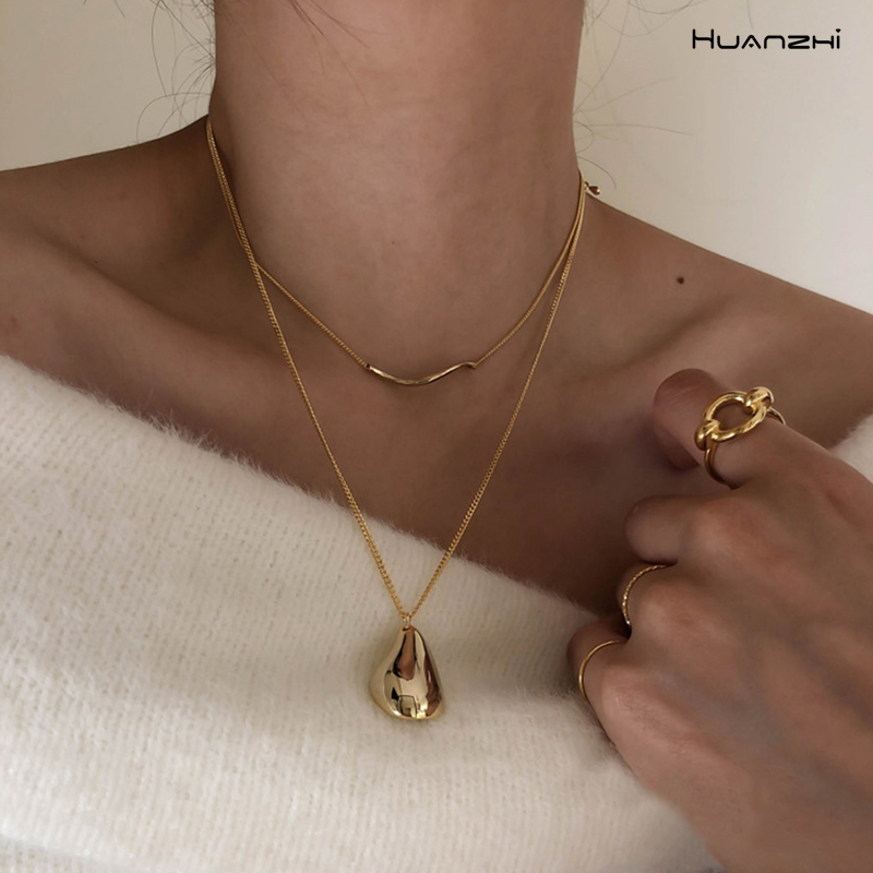 Huanzhi 2 stk/sæt vanddråbe uregelmæssige halskæder bølgeform guld halskæder til kvinder minimalistisk abstrakt halskæde smykker
