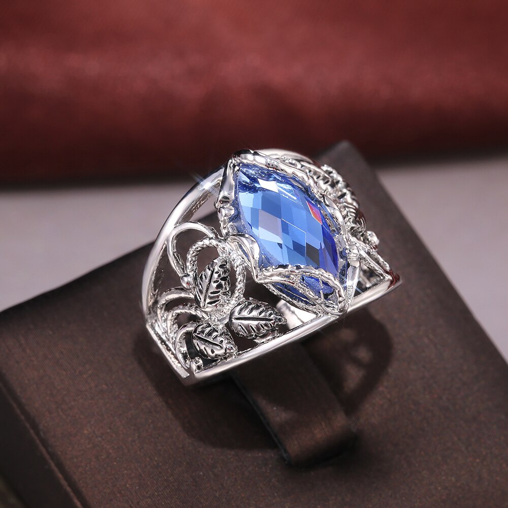 Huitan Singolo grande blu cavallo occhio Trapano Mosaico Anello di Barretta per Le Donne vuoto Foglie Modello Intorno Al Iperbole di Cerimonia Nuziale Anello punk SKU