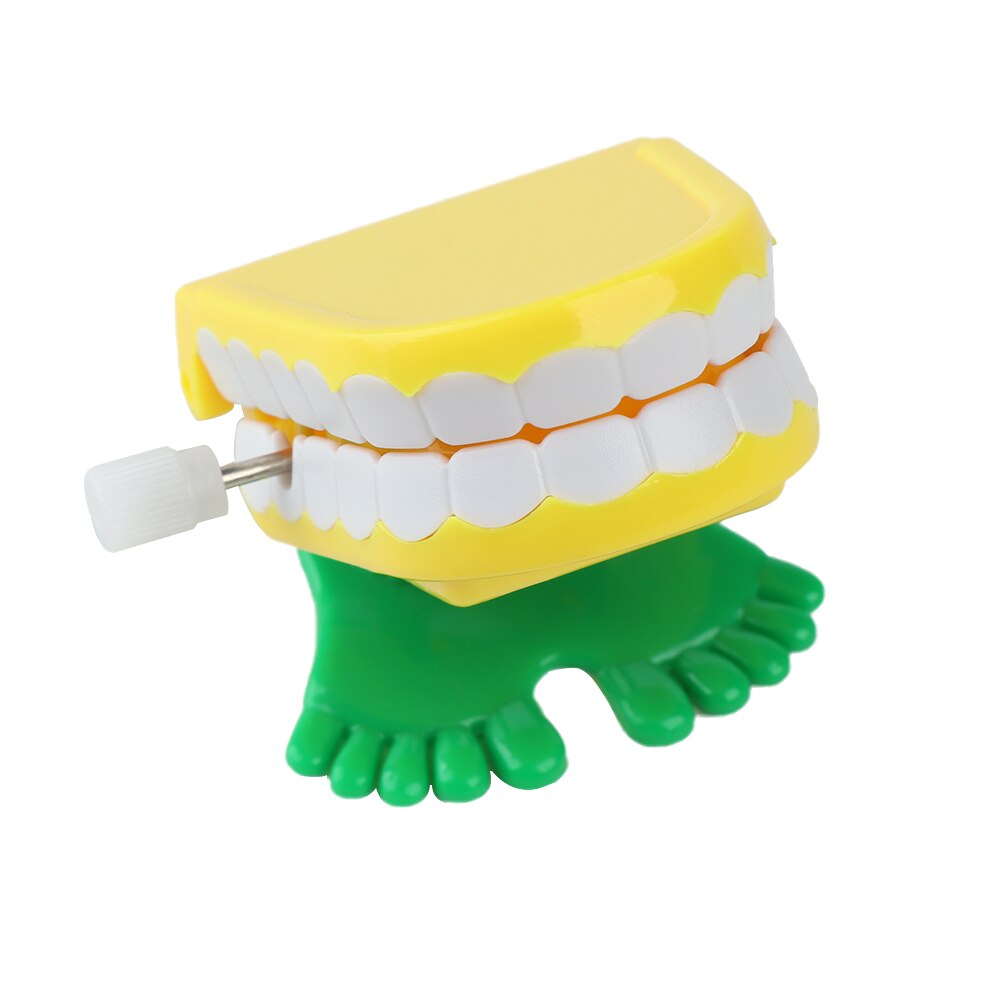 1Pcs Funny Klapperende Springen Lopen Tanden Vorm Clockwork Speelgoed Mini Kinderen Kerst Dier Tand Speelgoed Wind Up Speelgoed: Small teeth jumping