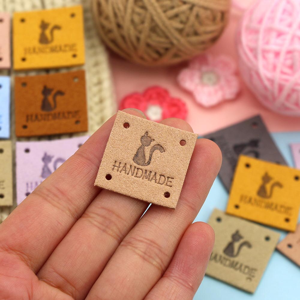 20 st fyrkantiga kattläderetiketter handgjorda etiketter för mössor stickade handgjorda kläder etikett dekorväska scarf plagg tillbehör