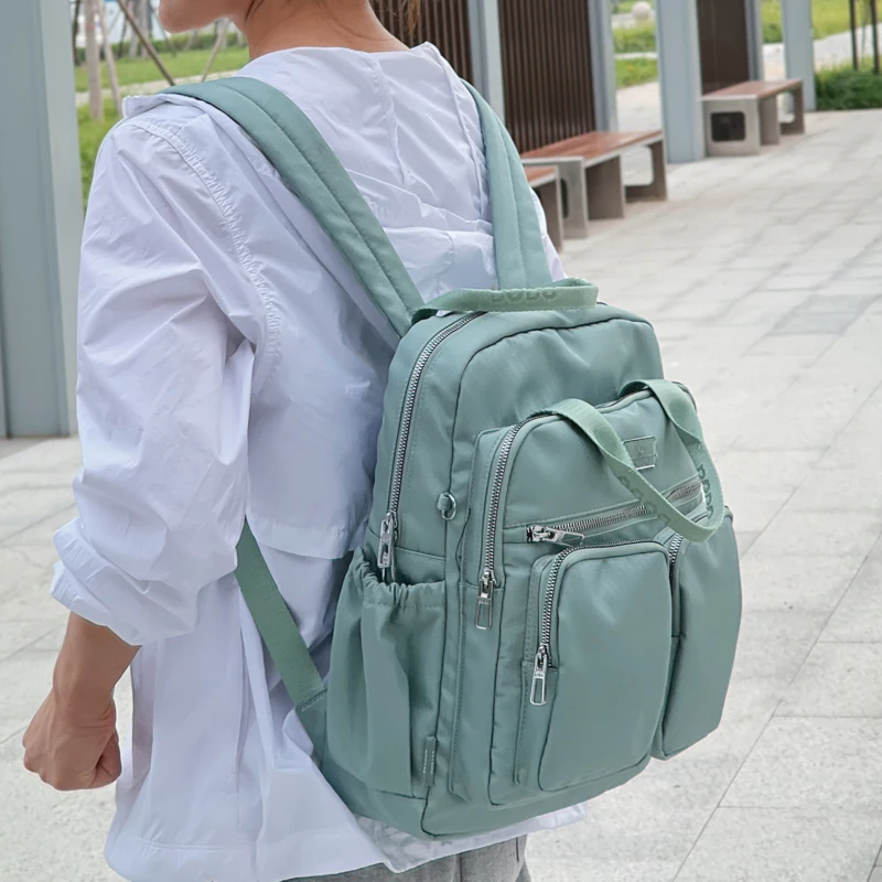 Zaino da viaggio per donna Borsa da scuola ad alta capacità Borsa per laptop leggera e impermeabile Zaino da cabina con tasche multiple per uomo