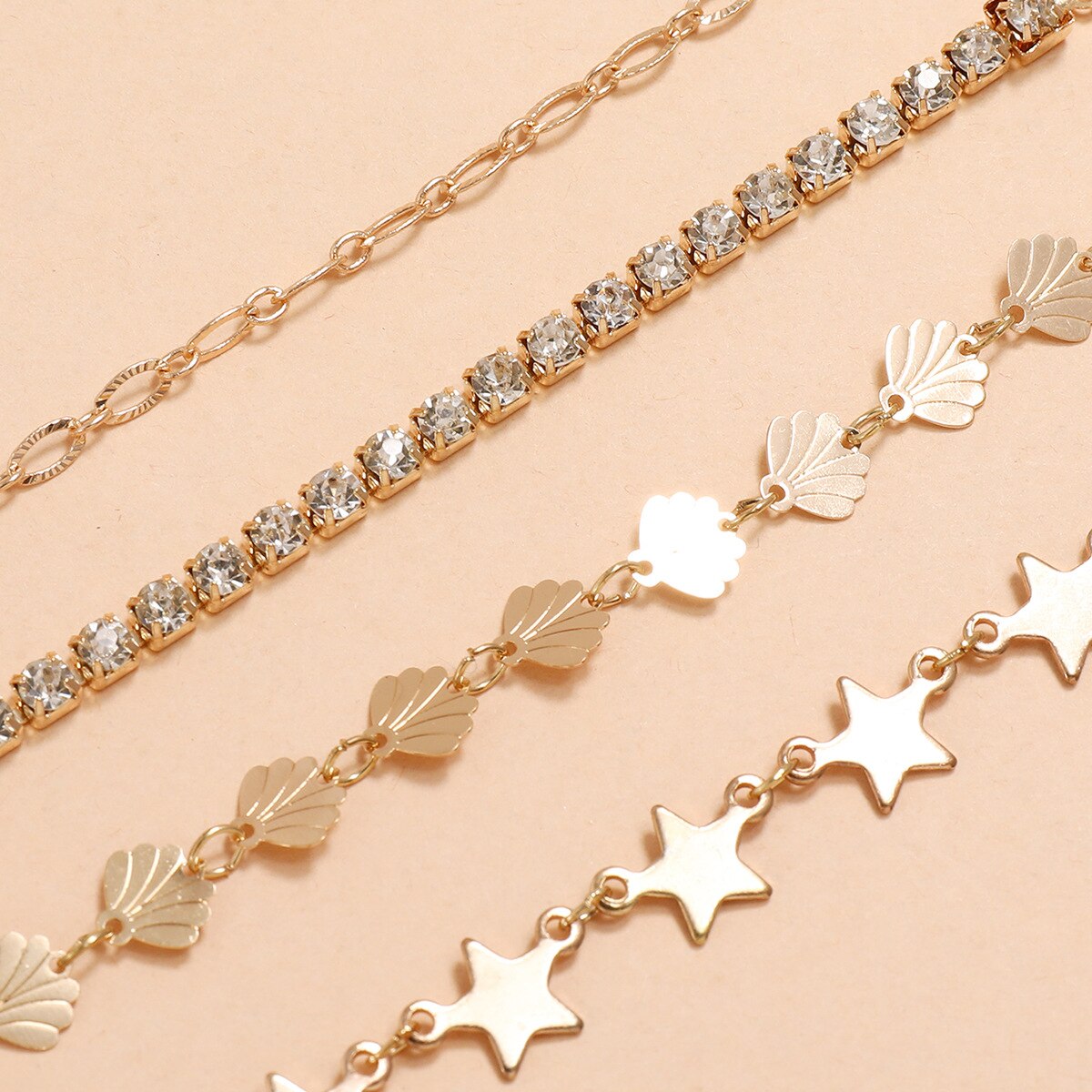 Armbanden met bedels van legering in goudkleur, sterren en schelpen, set van 4 , armbanden met strasssteentjes voor dames, sieraden en handkettingen