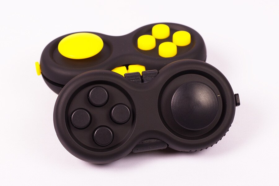 Decompression handle four generation game handle decompression cube handle gadget pad decompression toy: Yellow