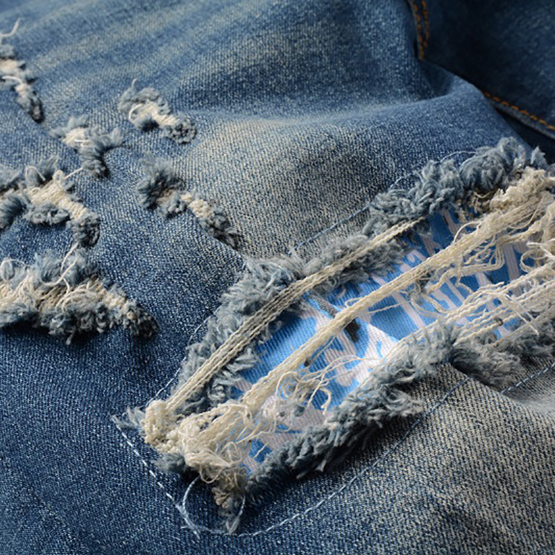 Jeans Patch da uomo con stampa Bandana Paisley fori Streetwear pantaloni strappati in Denim elasticizzato strappato pantaloni Slim affusolati