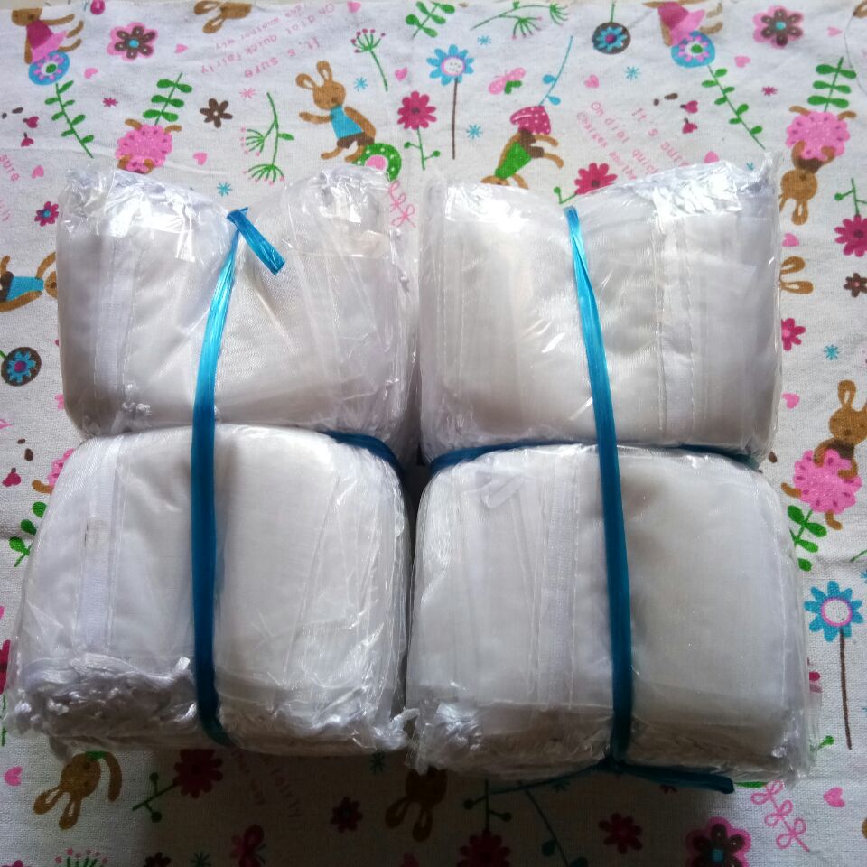 100 sztuk biały woreczki na biżuterię z organzy torba ze sznurkiem opakowanie na biżuterie wyświetlacz woreczki 7x9 9x12 10x15cm Wedding Party prezent saszetka