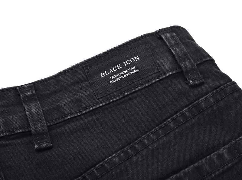 negro icono Hombres estilo ceñido rasgado Jeans Hiphop Bordado de letras agujero roto hombre Casual Jeans pantalones vaqueros