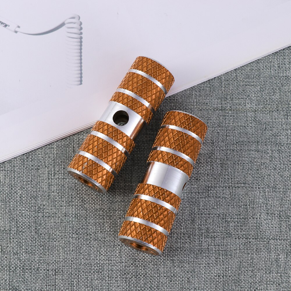 Een paar aluminiumlegering fiets cilinder stoel as stunt pegs voor mountainbike (zwart)