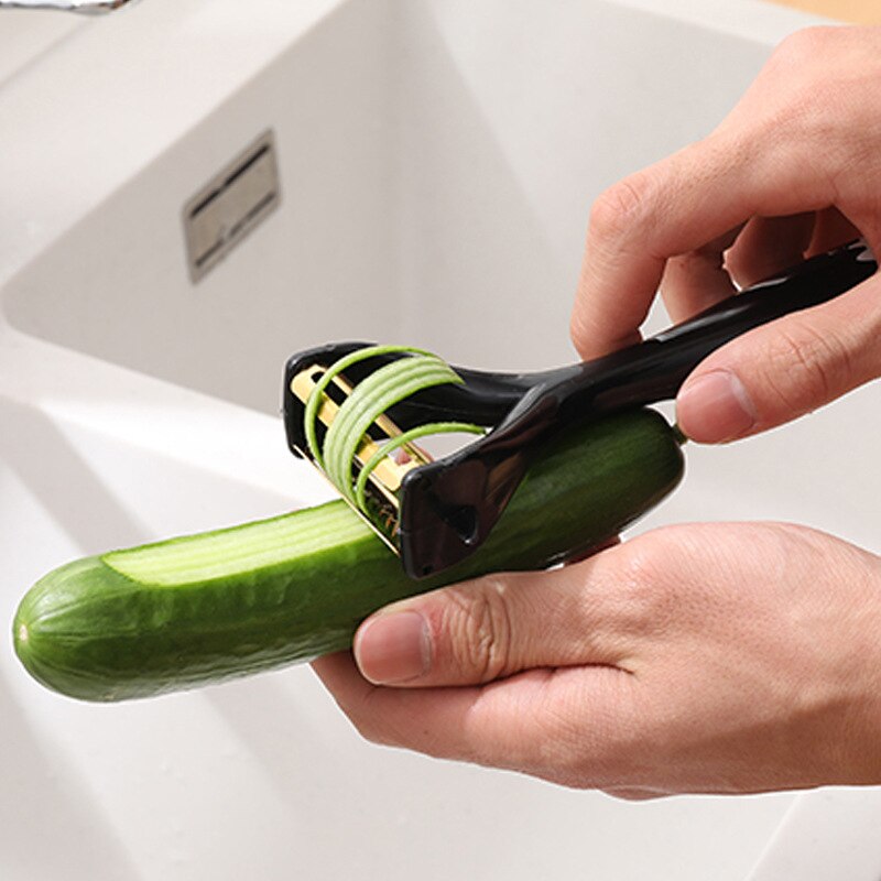 Éplucheur sur pied en acier inoxydable, râpe multifonctionnelle moderne et minimaliste, éplucheur de fruits et légumes