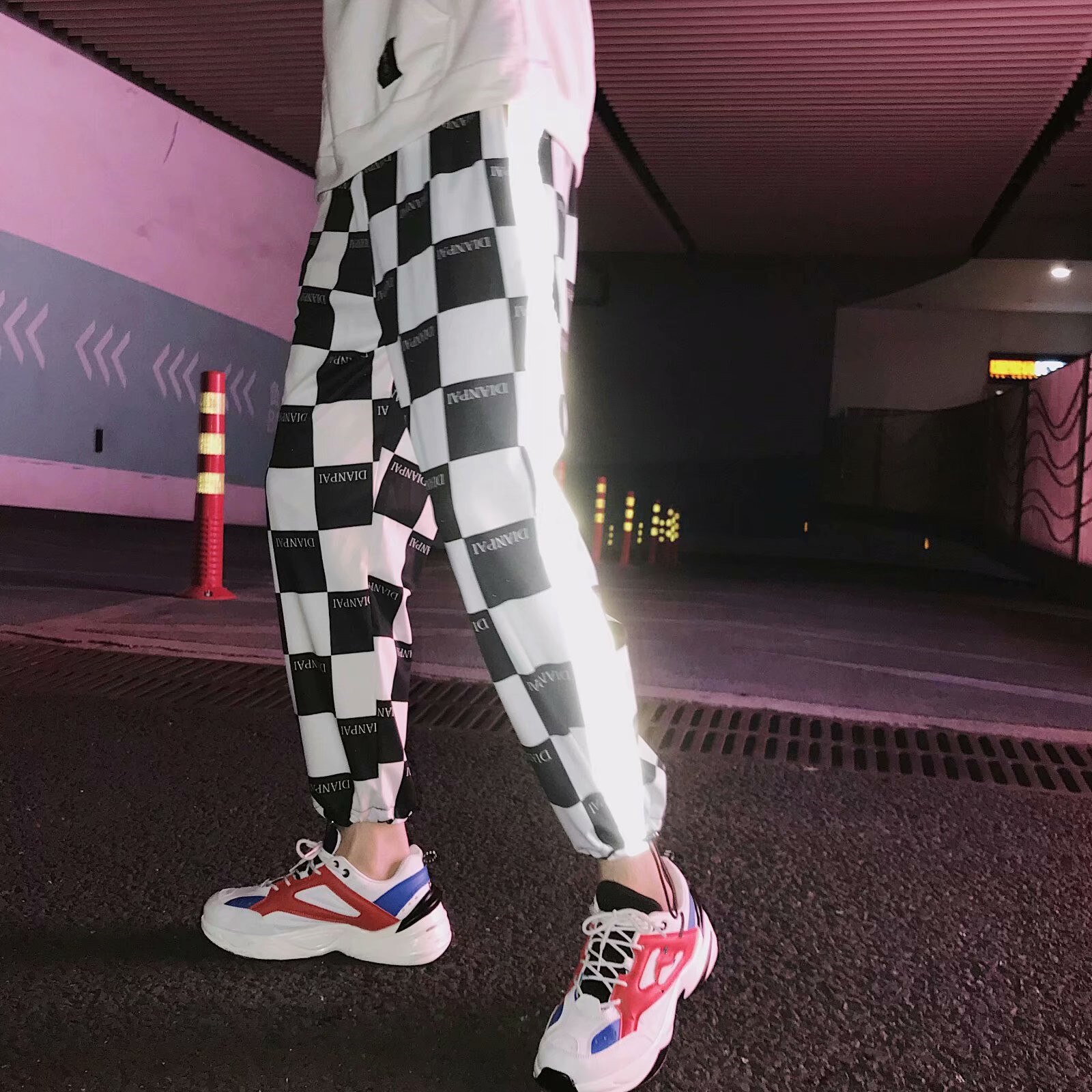 Pantalones reflectantes de empalme para hombre, ropa de calle a la , color blanco y negro, estilo Hip Hop, con cintura elástica