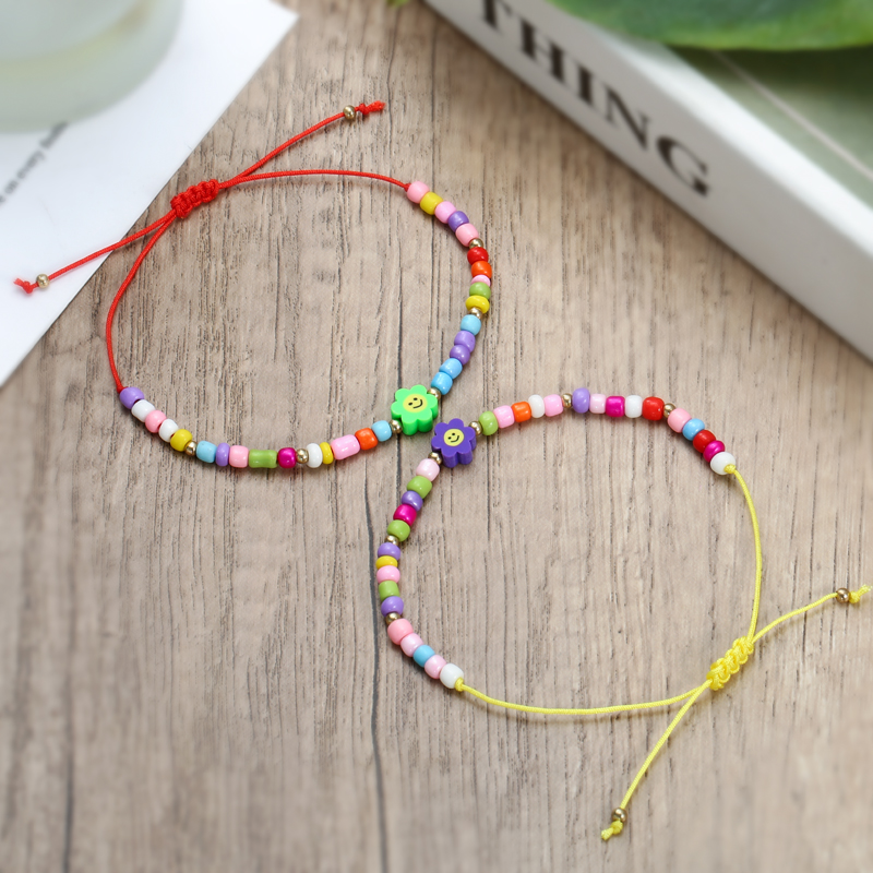 Conjunto de pulsera trenzada con cuentas para mujer y niño, brazalete de cuerda ajustable con abalorios de flores de concha de colores, 12 Uds./lote