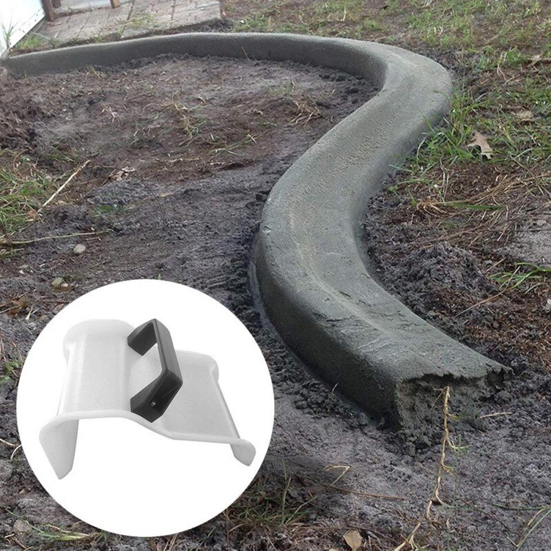 Muovilaastin betonilastan rakennustyökalut kahvalla muurauskäyttöiset lastat puutarhapihan maisemiin