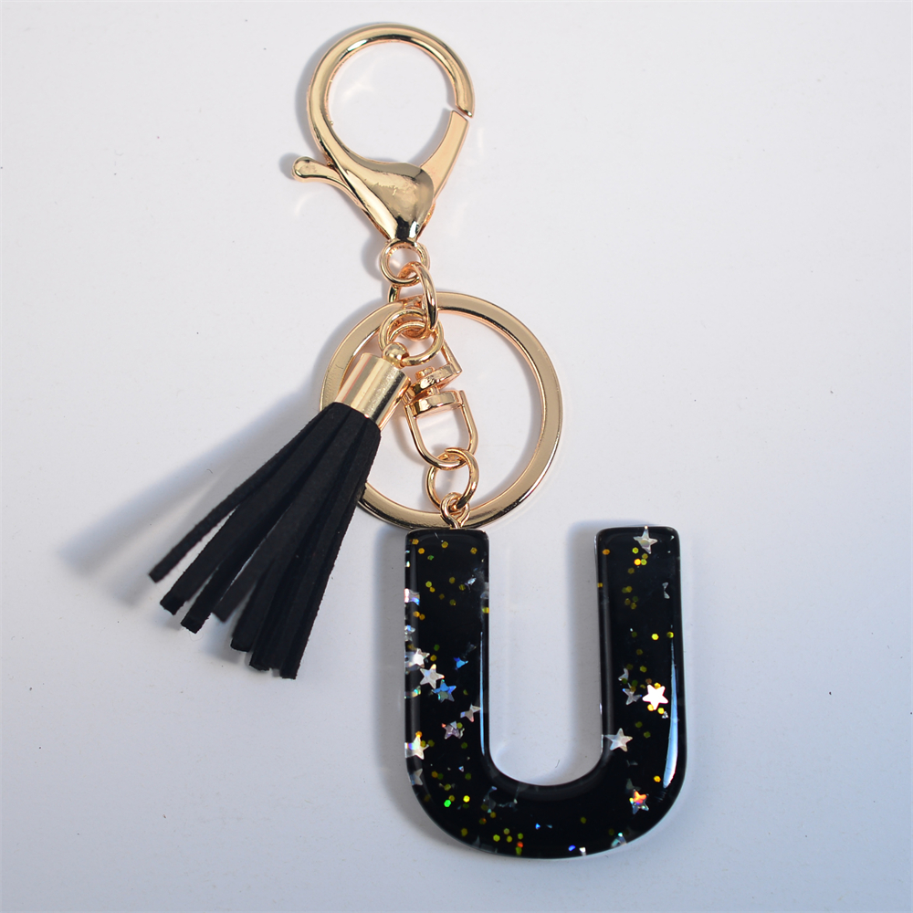 Schwarze Initialen A-Z Schlüsselanhänger Glitzer Stern Pailletten Harz Buchstaben Schlüsselanhänger mit Quaste für Frauen Tasche Ornamente Charm Autoschlüsselhalter