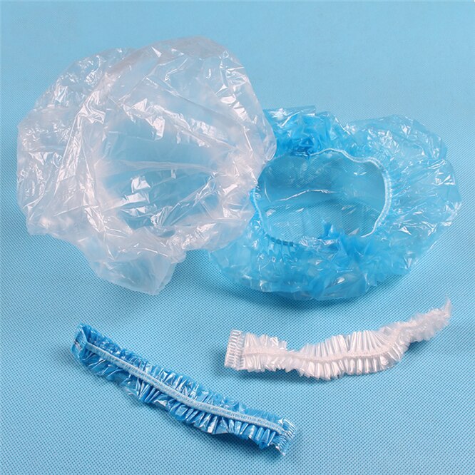Bonnet de bain élastique jetable, 100 pièces/lot, épais, pour hôtel, bonnet de douche, transparent, produits pour Salon de coiffure
