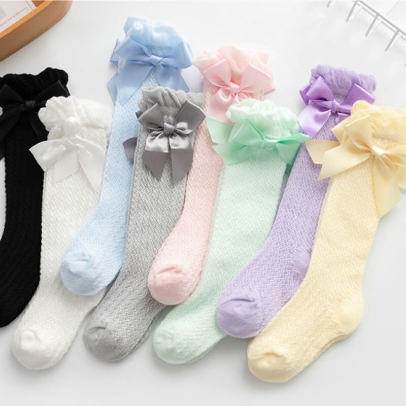 Barn flickor kunglig stil rosett knähöga nätstrumpor.baby toddler bowknot in tube socks.kid ihåliga strumpor sox 0-4y