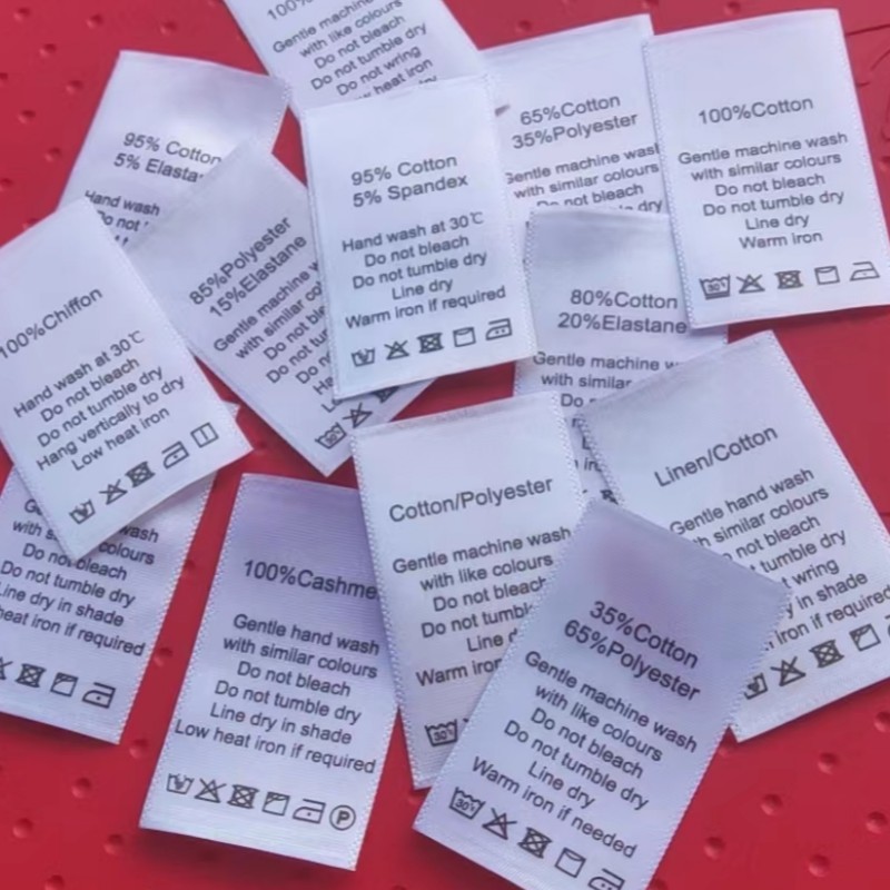 100 st vita tvättrådsetiketter för bomull/siden/kashmere/ull/linne/polyester/elastan med tryck av satintyg