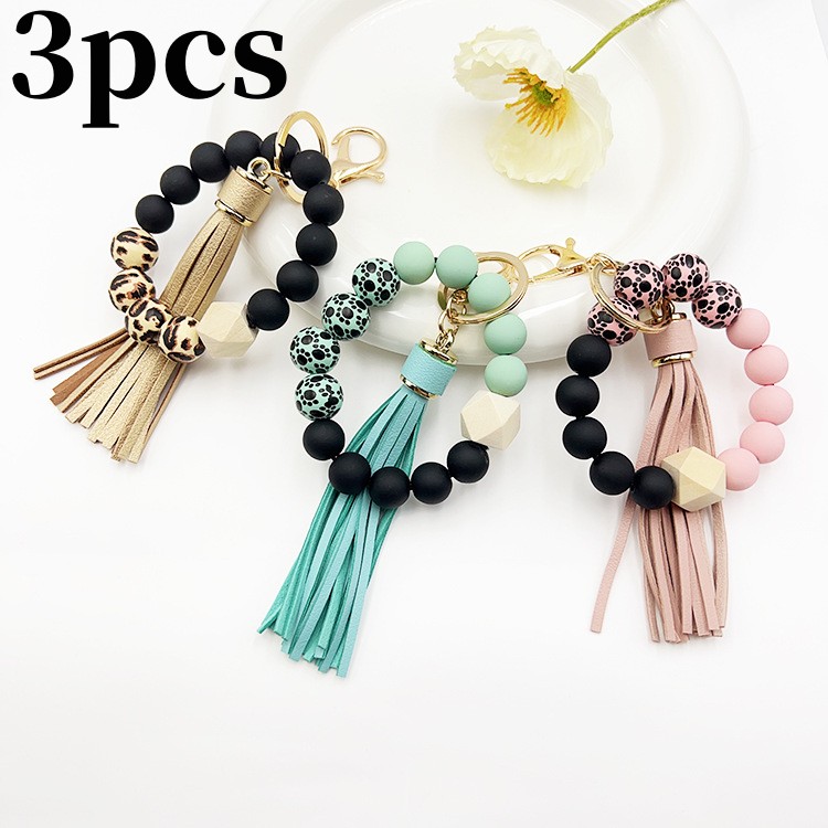 Llavero con cuentas de silicona para hombre y mujer, pulsera con cuentas y borlas para colgar carteras: Champán