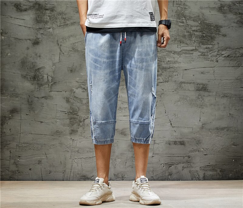 Sommer mænds læglange korte jeans afslappet løse elastiske denimshorts tøj til mænd ,y877: Lyseblå / 36