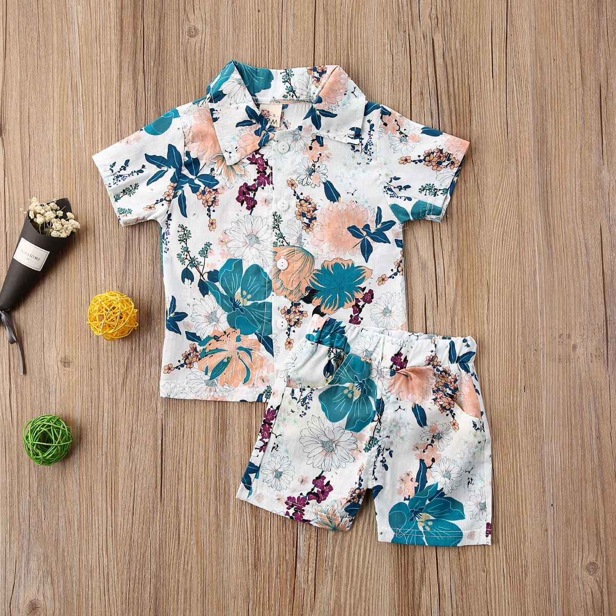 Dziecięce zestawy ubrań dla chłopców 12 kolorów kwiatowy Print t-shirty z krótkim rękawem topy + spodenki wakacyjny strój na lato 1-6Y