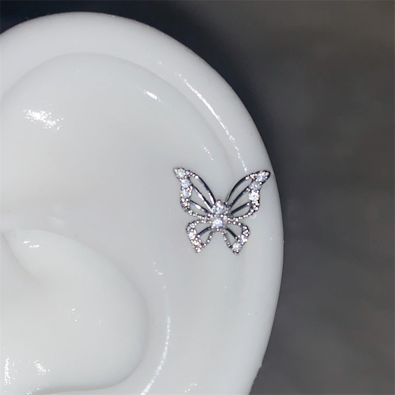 1 stücke glänzend Kreuz Blau Zirkon 316L Edelstahl Ohr Knochen Nagel Y2K Silber Farbe Ohrring für Frauen Cochlea zubehör