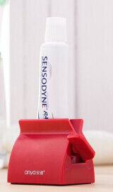 Tandpasta knijpers badroller tube tandpasta knijper tandpasta dispenser stoel houder standaard: Rood